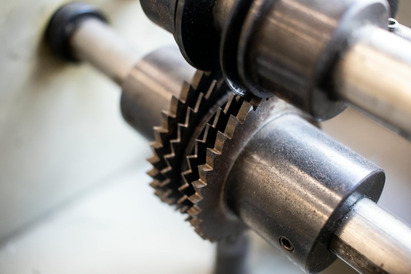 Roller speargun mechanism